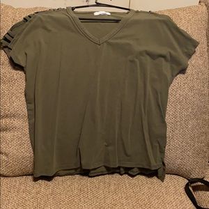 Green Top with hole in shoulders.
